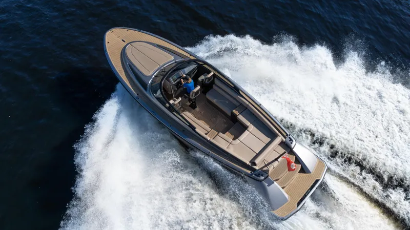 Slide: The Image of Luxury 2022 Wajer yacht cruising swiftly on open water, aerial view. - 11