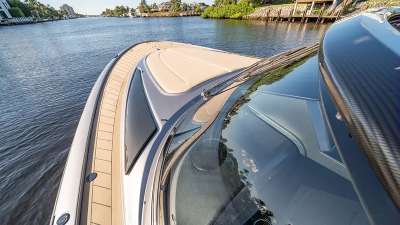 Slide: The Image of 2022 Wajer boat cruising on a scenic river with lush greenery. - 7