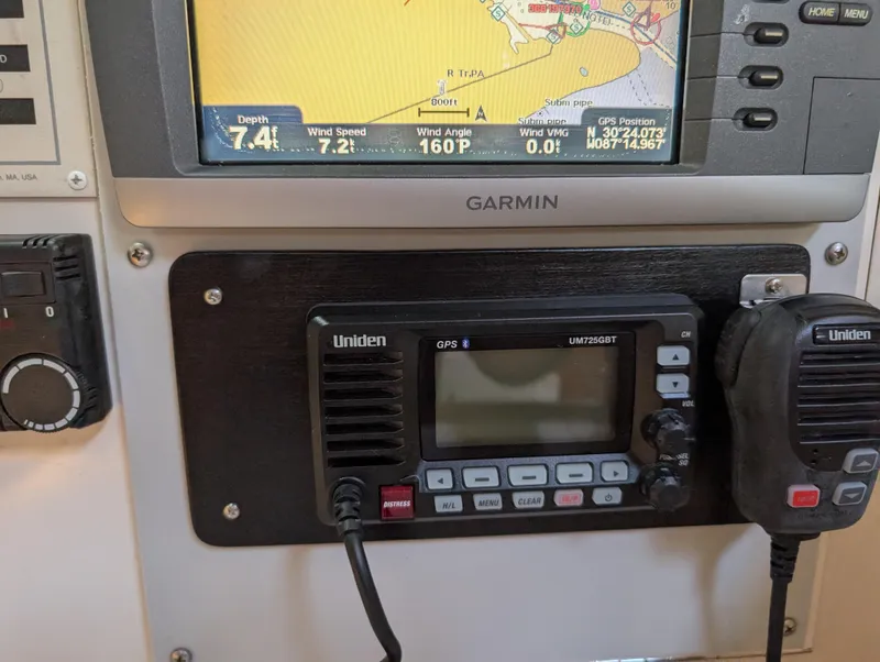 Slide: The Image of Garmin and Uniden marine navigation equipment on a 1998 Caliber 40 LRC sailboat. - 26