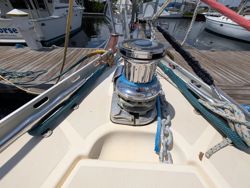 Slide: The Image of Deck of 1998 Caliber 40 LRC sailboat with winch and ropes. - 48