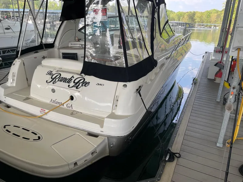 Slide: The Image of 2007 Sea Ray 320 Sundancer docked, rear view with canopy, in Atlanta, GA marina. - 3