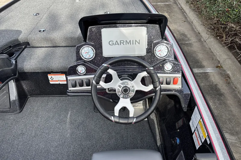 Slide: The Image of Steering console of 2025 Nitro Z19 Pro boat with Garmin display and gauges. - 15