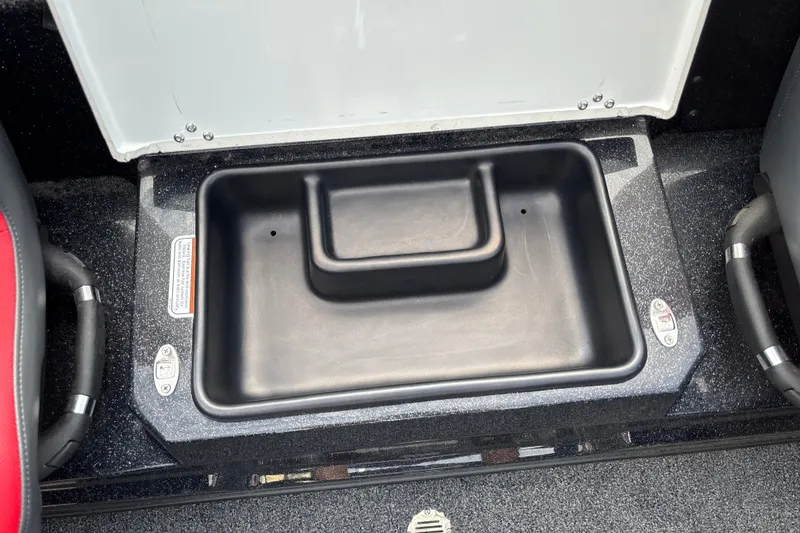 Slide: The Image of Storage compartment in a 2025 Nitro Z19 Pro boat, featuring a sleek black interior. - 24