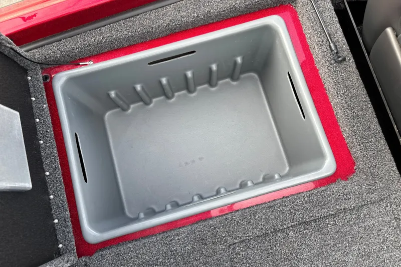 Slide: The Image of Storage compartment in 2025 Nitro Z19 Pro boat, featuring a spacious, carpeted interior. - 22