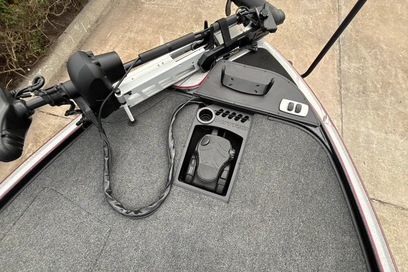 Slide: The Image of 2025 Nitro Z19 Pro boat deck with trolling motor and foot pedal controls. - 30