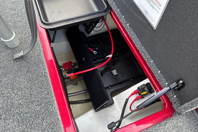 Slide: The Image of Open storage compartment in 2025 Nitro Z19 Pro boat, showing wiring and battery setup. - 21
