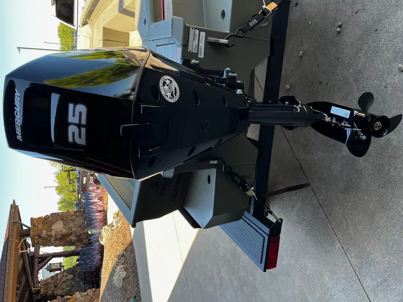 Slide: The Image of 2025 Tracker Grizzly 1650 T Prairie Wings Edition with Mercury 25 outboard motor. - 4