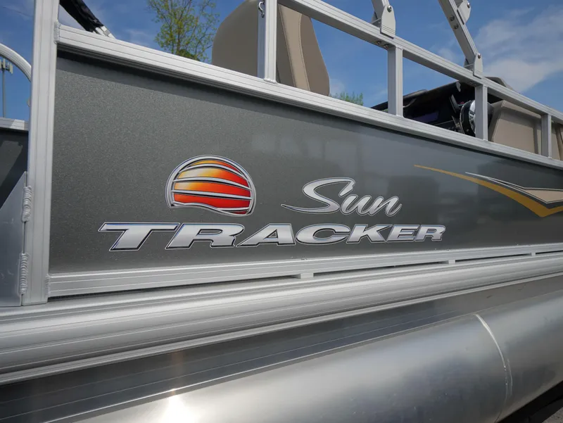 Slide: The Image of 2025 Sun Tracker Party Barge 18 DLX pontoon boat side view with logo. - 11