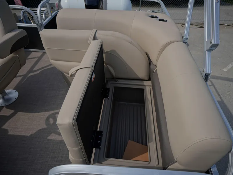 Slide: The Image of 2025 Sun Tracker Party Barge 18 DLX pontoon boat with open storage compartment. - 8