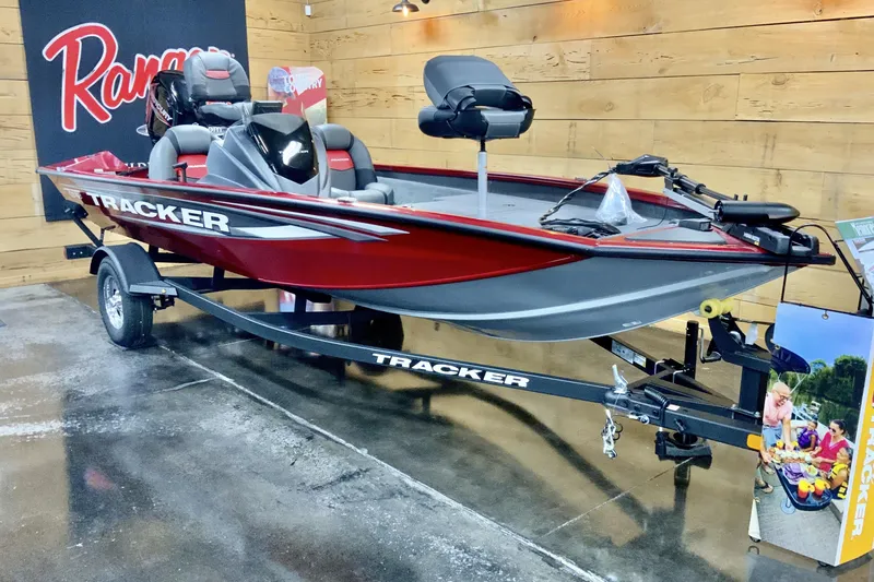 The Image of 2025 Tracker Pro Team 175 boat on display, featuring sleek red and gray design. - 0