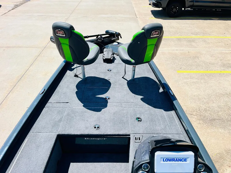 Slide: The Image of 2025 Ranger RT188C boat interior with two seats and Lowrance fish finder. - 46