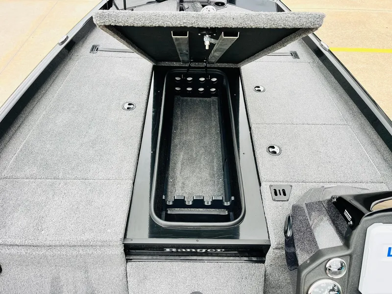 Slide: The Image of 2024 Ranger RT198P boat with open storage compartment, showcasing spacious interior design. - 14