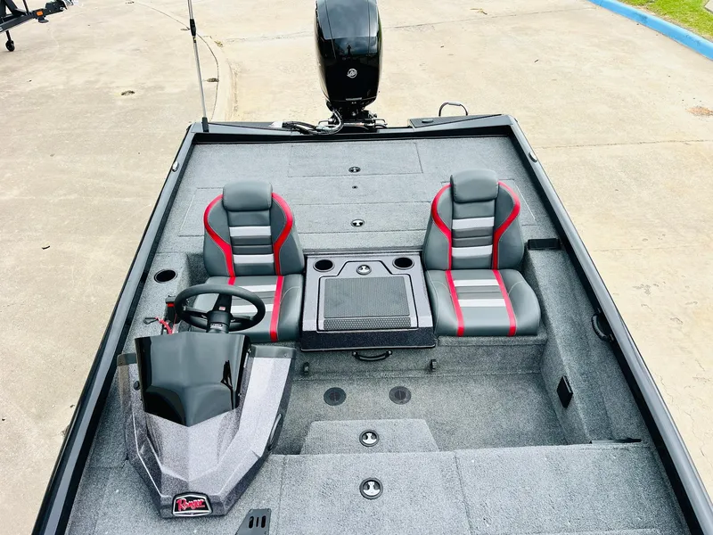 Slide: The Image of 2024 Ranger RT198P boat interior with dual seats and steering console. - 22