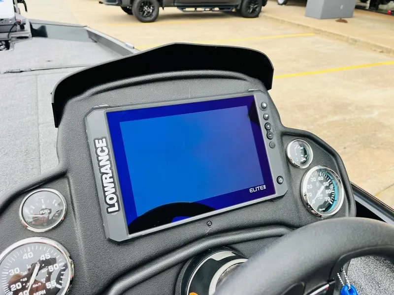 Slide: The Image of 2024 Ranger RT198P boat dashboard with Lowrance Elite display and gauges. - 27