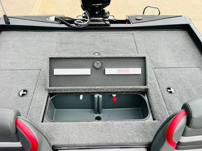 Slide: The Image of 2024 Ranger RT198P boat interior with storage compartment and seating. - 29
