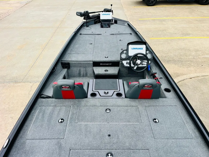 Slide: The Image of 2024 Ranger RT198P boat interior with Lowrance electronics and dual seating. - 8