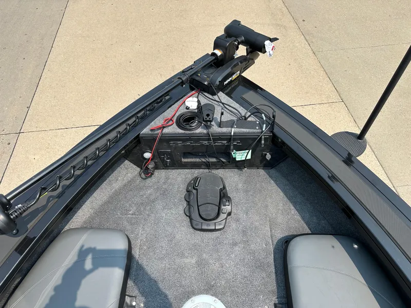 Slide: The Image of 2025 Tracker Targa V-19 Combo boat interior with trolling motor and seating. - 3
