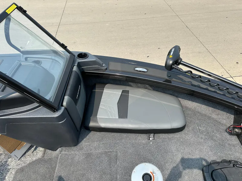 Slide: The Image of 2025 Tracker Targa V-19 Combo boat interior with seating and control panel. - 4