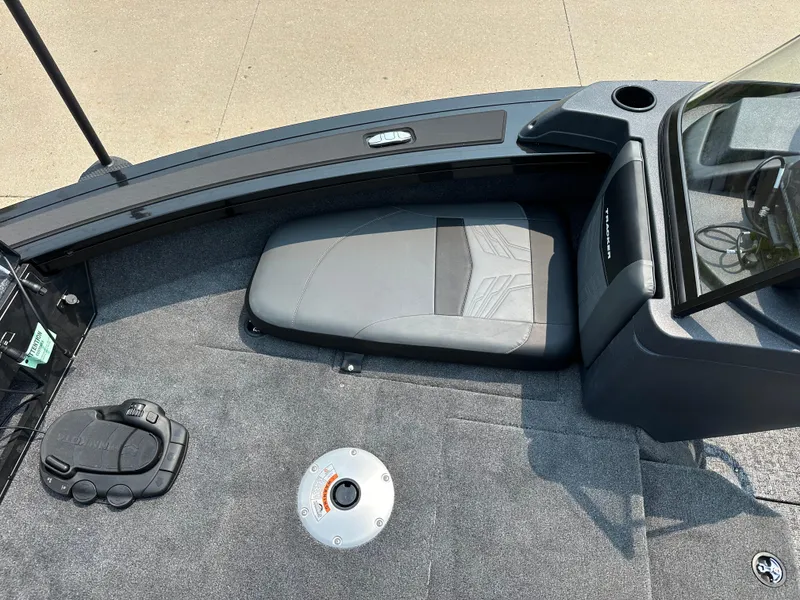 Slide: The Image of 2025 Tracker Targa V-19 Combo boat interior with seating and control panel. - 5