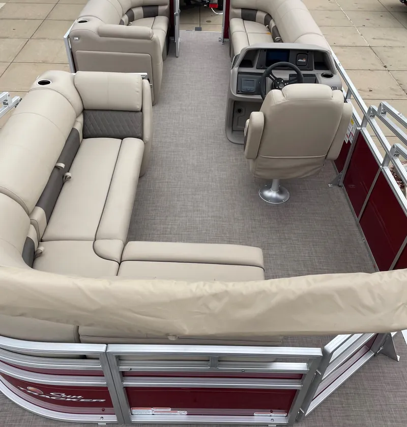 Slide: The Image of 2025 Sun Tracker Party Barge 20 DLX pontoon boat with spacious seating and modern design. - 2