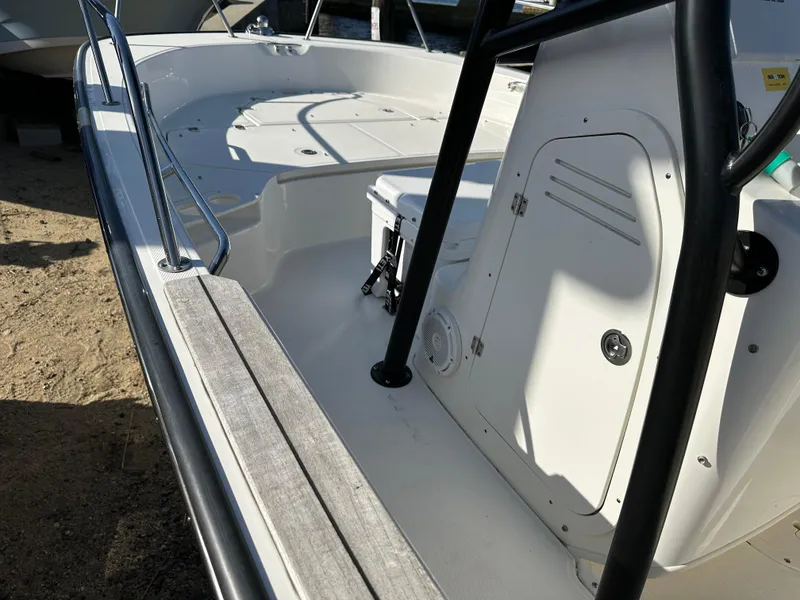 Slide: The Image of 2024 Boston Whaler 190 Montauk boat interior with seating and storage compartments. - 10