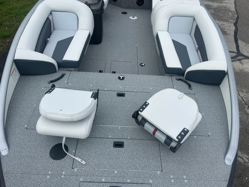 Slide: The Image of 2025 Lowe Deck SD224 boat interior with white and gray seating arrangement. - 5