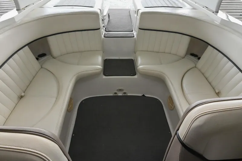 Slide: The Image of Interior of 2005 Cobalt 262 boat with white leather seating. - 12