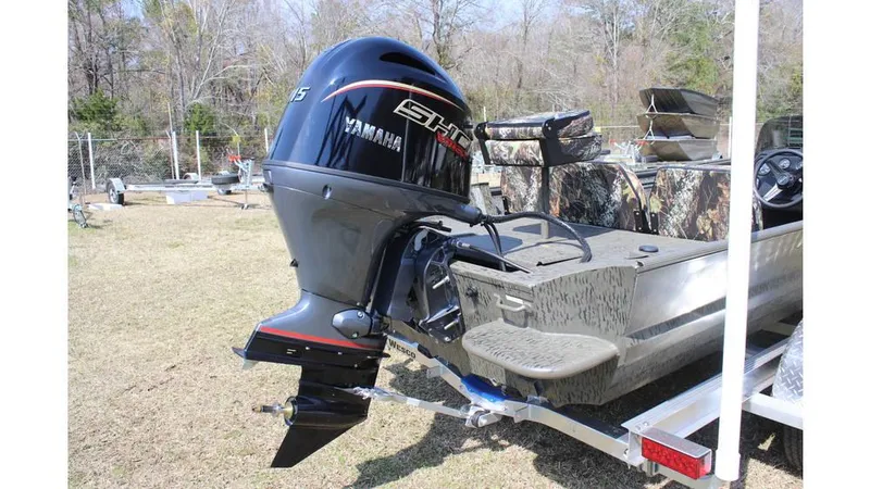 Slide: The Image of 2025 War Eagle 860LDSV Sportsman boat with Yamaha outboard motor on trailer. - 3