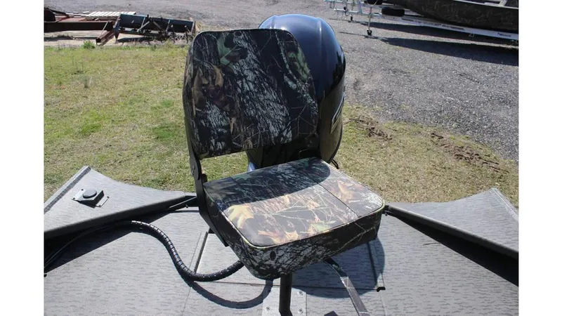 Slide: The Image of Camouflage seat on 2025 War Eagle 860LDSV Sportsman boat, outdoor setting. - 4
