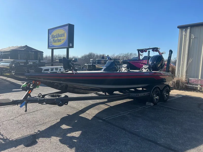 Slide: The Image of 2025 Skeeter ZXR21 boat on trailer at Blackbeard Marine dealership. - 4