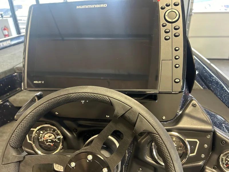 Slide: The Image of Steering console of 2025 Skeeter ZXR20 with Humminbird Helix 12 display. - 6