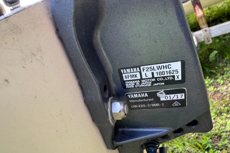 Slide: The Image of Yamaha motor label on a 2015 Carolina Skiff J16CC boat engine. - 4