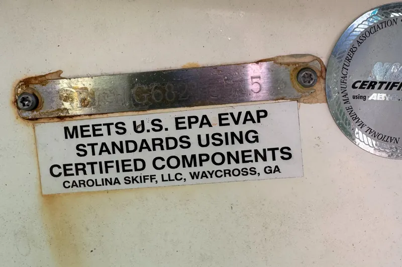 Slide: The Image of 2015 Carolina Skiff J16CC label, EPA compliance, certified components, Waycross, GA. - 5