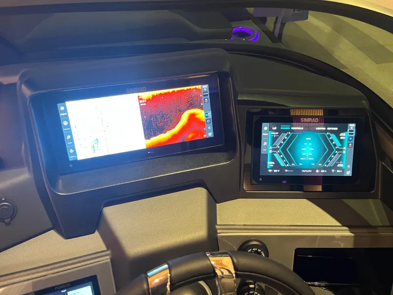 Slide: The Image of Dashboard of 2025 Avalon Excalibur LTD with advanced navigation displays. - 46