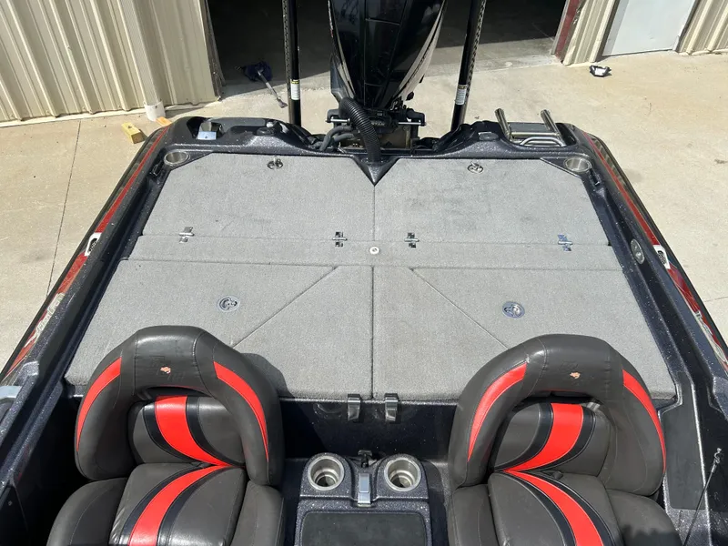 Slide: The Image of 2020 Bass Cat Lynx boat interior with dual seats and storage compartments. - 7