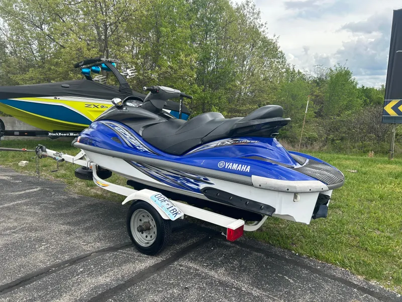 Slide: The Image of 2005 Yamaha WaveRunner FX Cruiser on trailer, parked outdoors. - 2