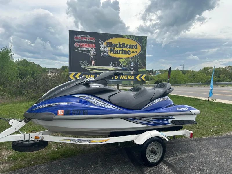 Slide: The Image of 2005 Yamaha WaveRunner FX Cruiser on trailer, parked near BlackBeard Marine sign. - 3
