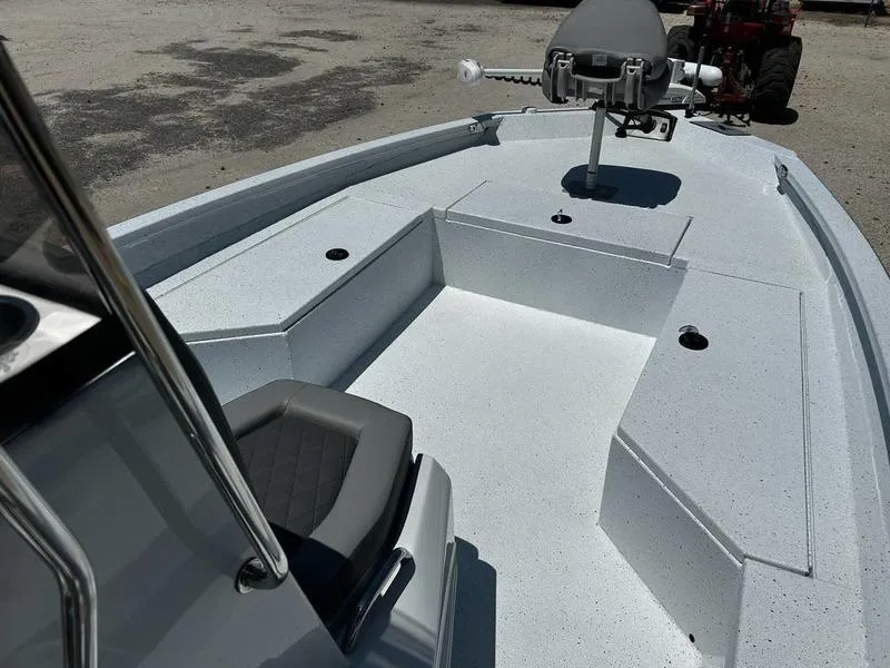 Slide: The Image of 2025 Xpress H22B boat interior with seating and steering, showcasing modern design and functionality. - 15