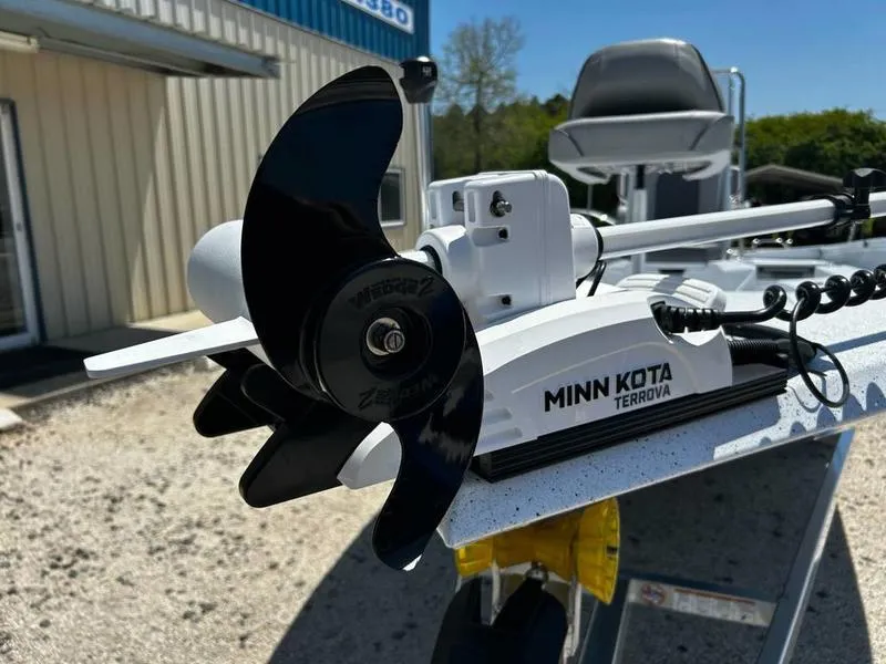 Slide: The Image of Minn Kota Terrova motor on 2025 Xpress H22B boat, outdoor setting. - 8