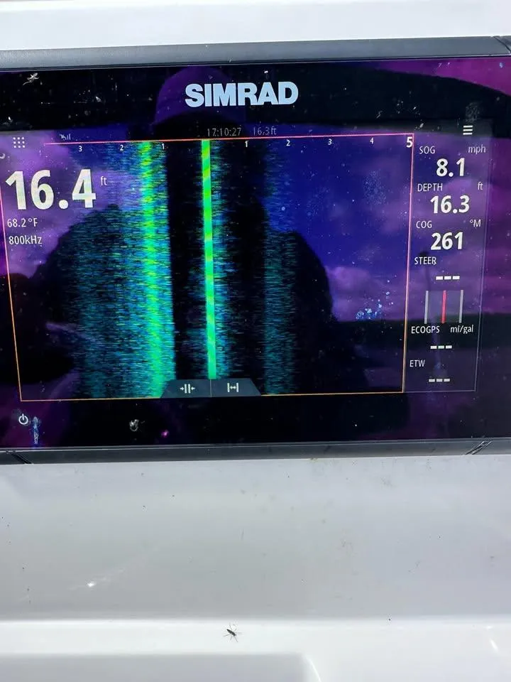 Slide: The Image of Simrad marine display on 2020 Yamaha Boats Robalo, showing sonar and navigation data. - 10