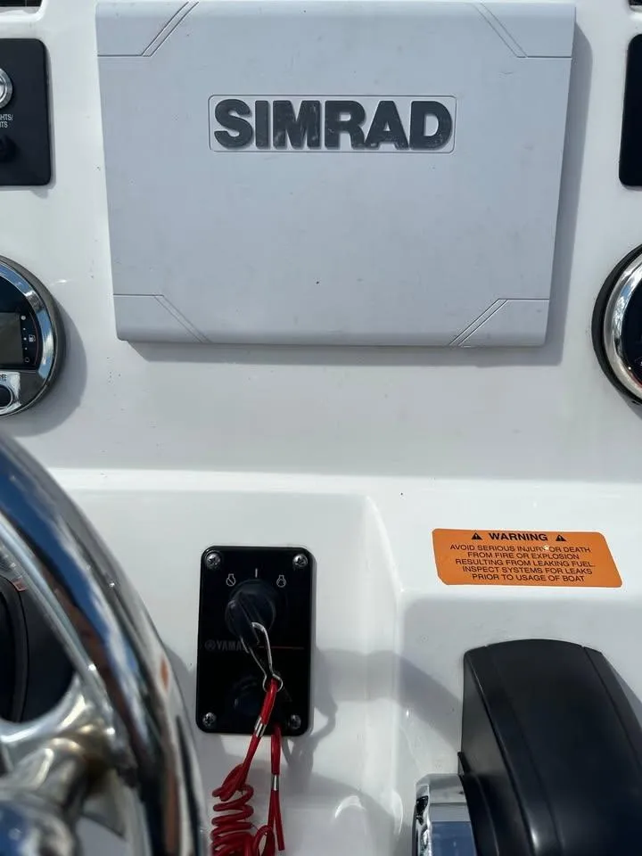 Slide: The Image of Yamaha Boats 2020 Robalo dashboard with Simrad navigation system. - 11