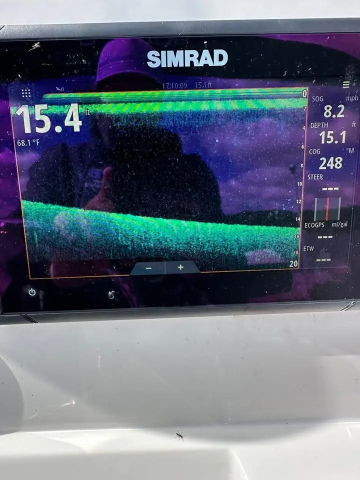 Slide: The Image of Simrad marine display on 2020 Yamaha Boats Robalo, showing depth and sonar data. - 13
