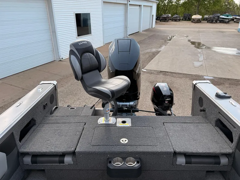 Slide: The Image of 2023 Lund 2275 Baron boat with a sleek design and comfortable seating. - 29