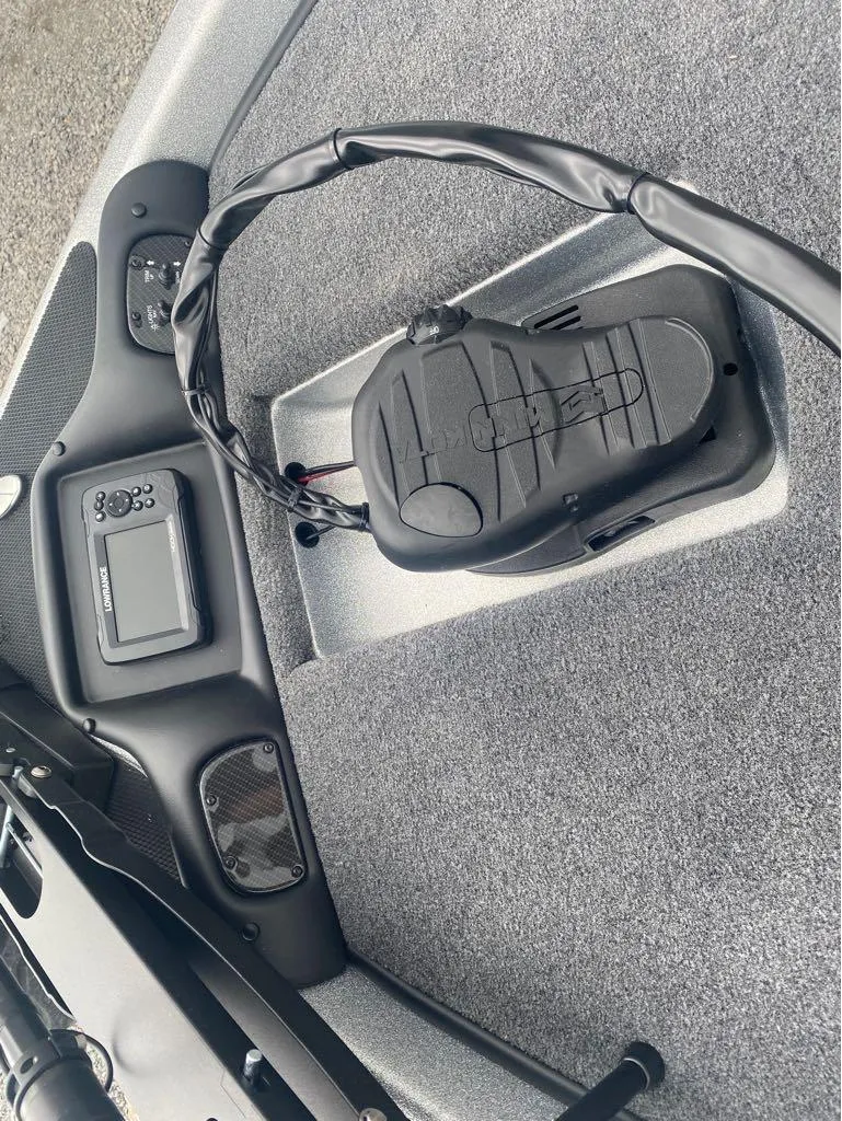 Slide: The Image of Phoenix 518 Pro 2025 boat interior with control panel and foot pedal. - 3