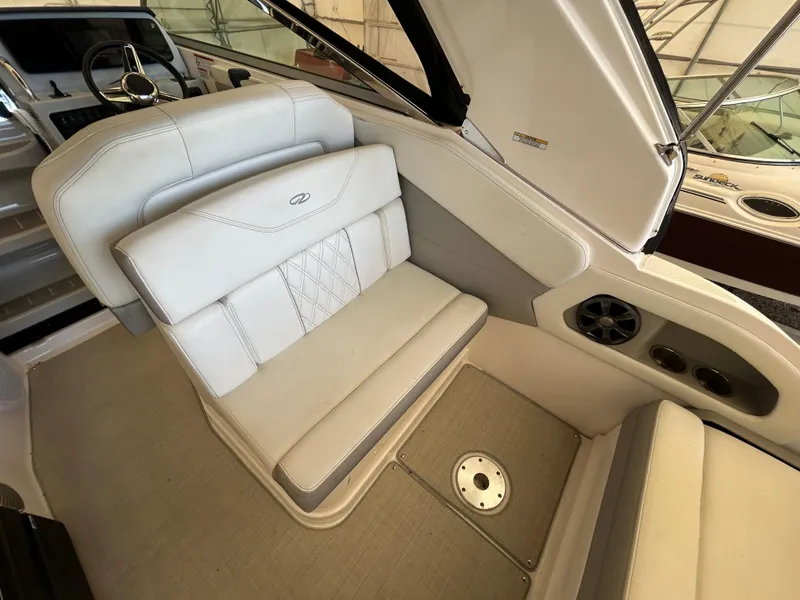 Slide: The Image of 2021 Regal 2800 Express boat interior with beige seating and modern design. - 6