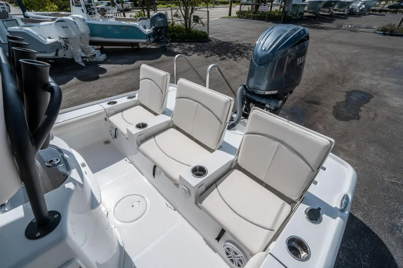 Slide: The Image of 2025 Sea Hunt BX 22 BR boat with seating and Yamaha outboard motor. - 13