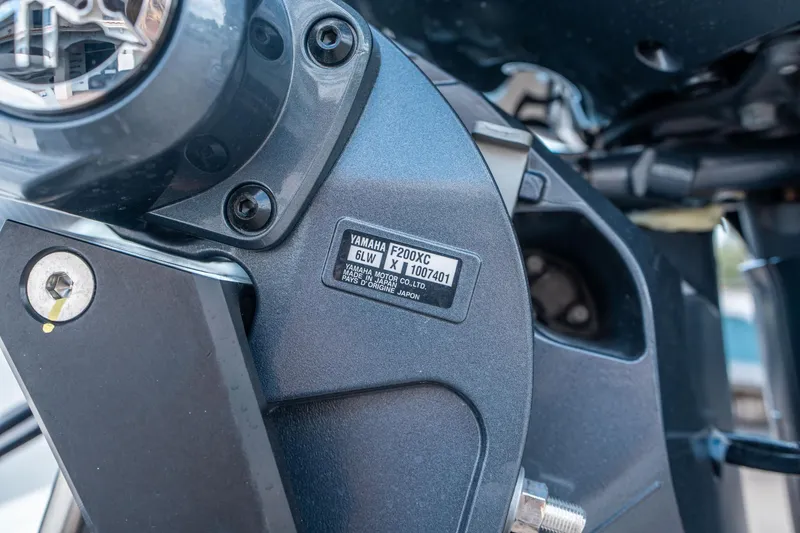 Slide: The Image of Close-up of Yamaha F200XC engine part on 2025 Sea Hunt BX 22 BR boat. - 27