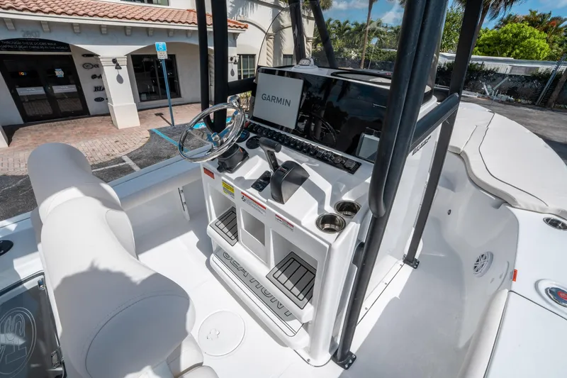 Slide: The Image of 2025 Sea Hunt BX 22 BR boat interior with Garmin navigation system and sleek design. - 17