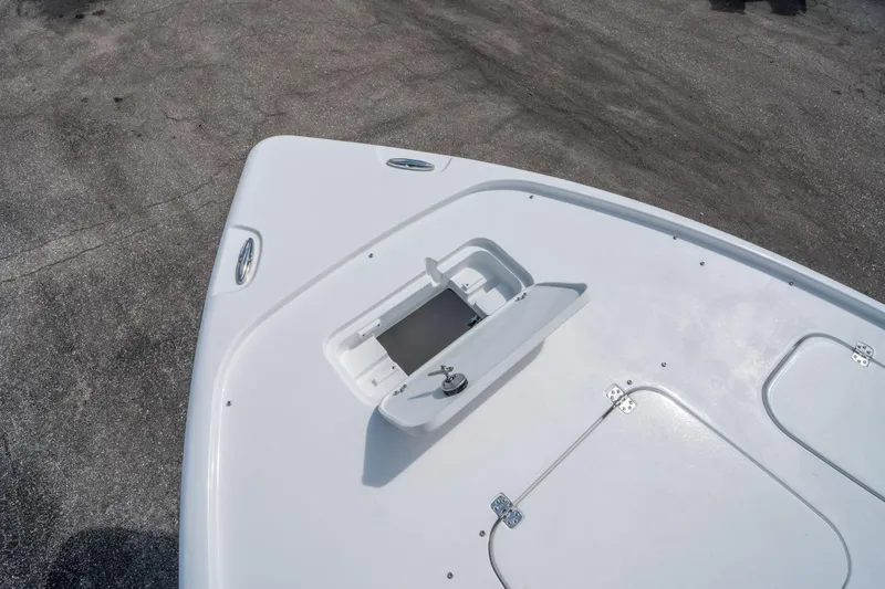 Slide: The Image of 2025 Sea Hunt BX 22 BR boat deck with storage compartment, viewed from above. - 26