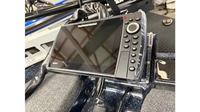 Slide: The Image of Fishfinder device on a 2025 Phoenix 819 Pro boat dashboard. - 3